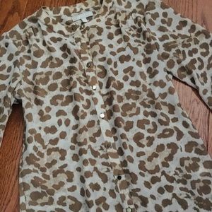 Animal print blouse with shiny gold buttons